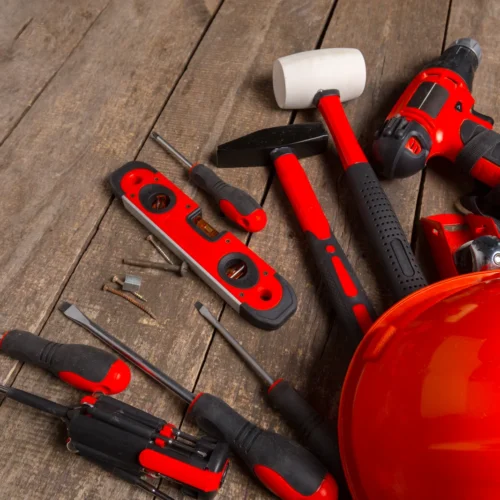 assorted-work-tools-on-wood-background-2025-02-25-15-41-34-utc (2) Assorted hand and power tools on wooden surface